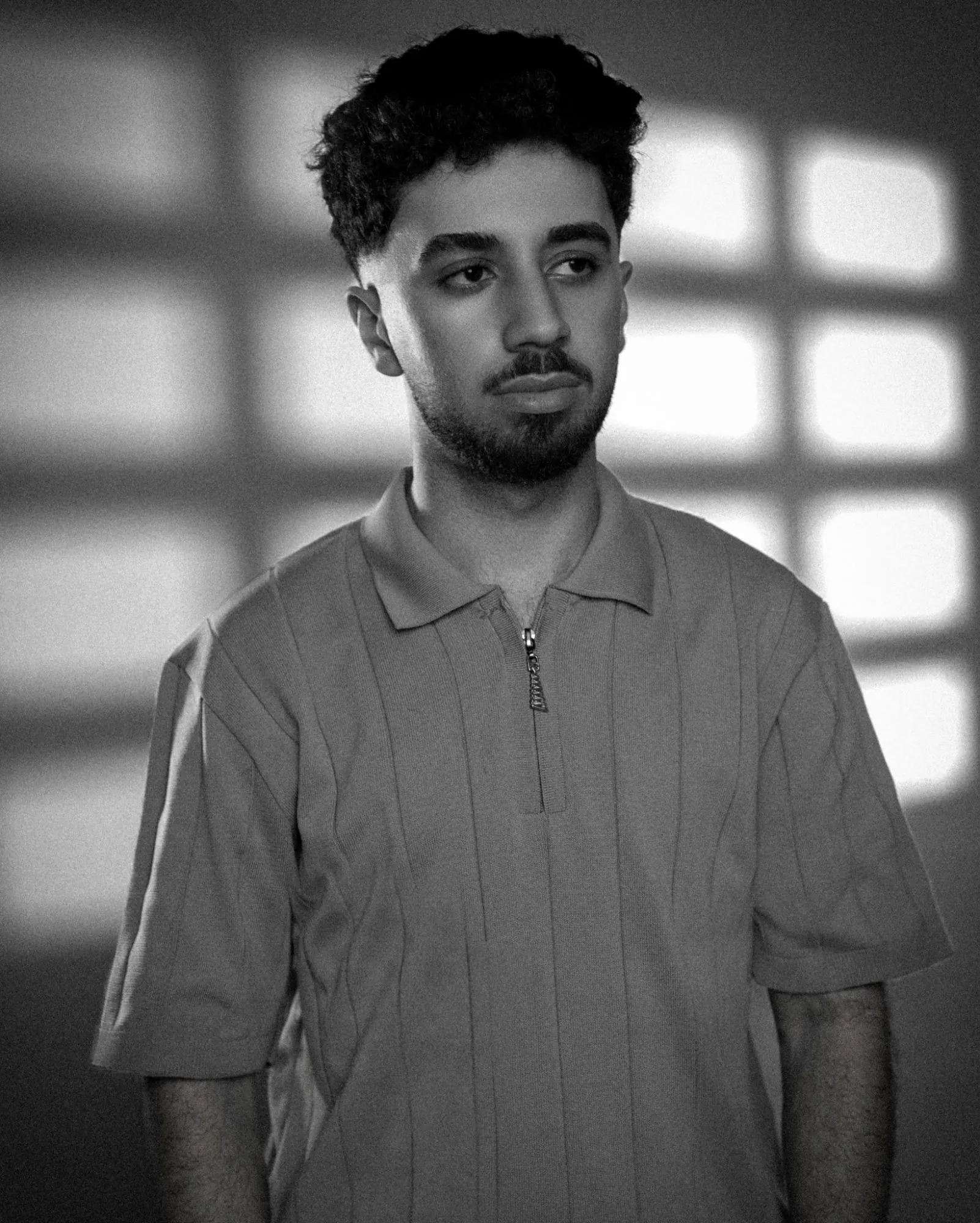 Hajo Sabri — black-and-white portrait with window light